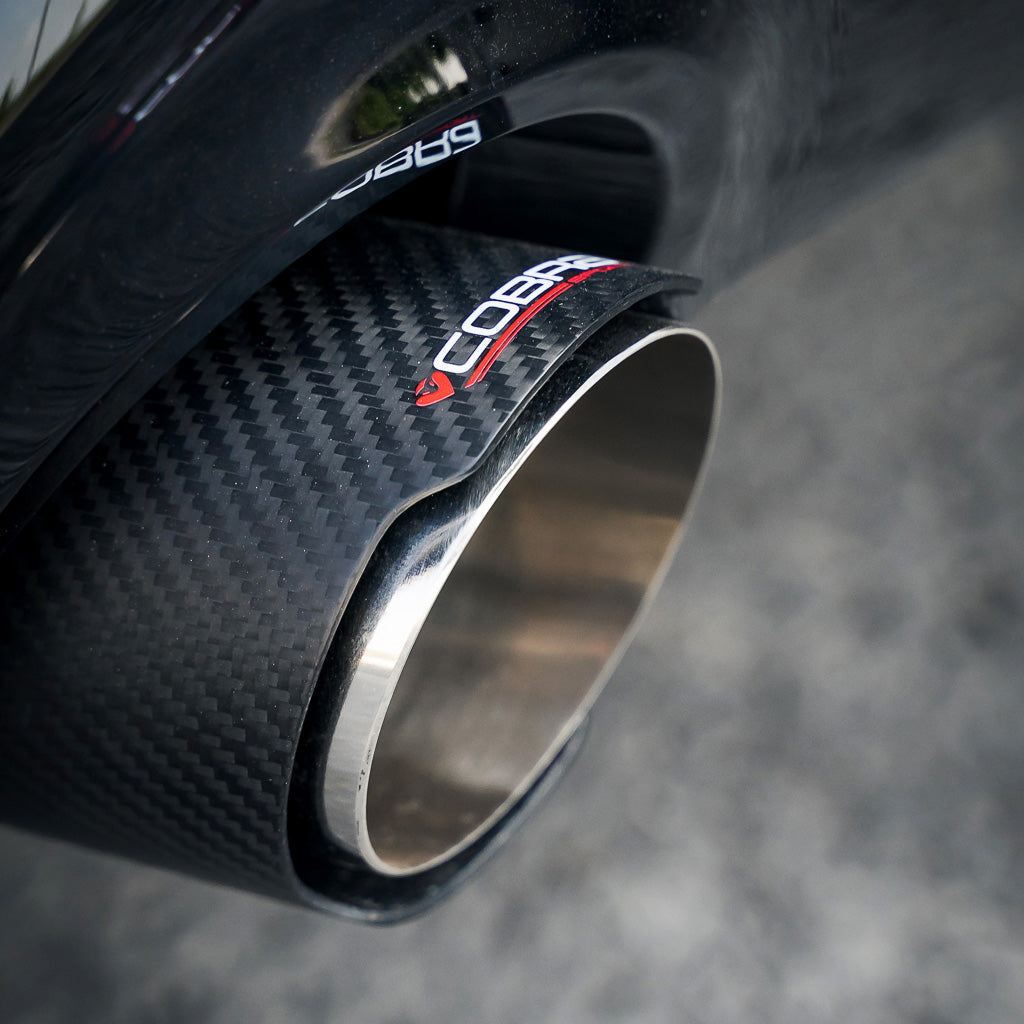 BMW 128ti Cobra Sport GPF/PPF back performance exhaust installed on vehicle, showing sleek black exhaust tips and sporty design.