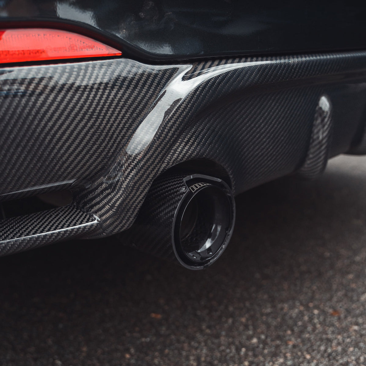BMW 2 Series F22/F23 carbon fibre diffuser by CT Carbon, featuring a sleek MP Style design for enhanced aerodynamics.