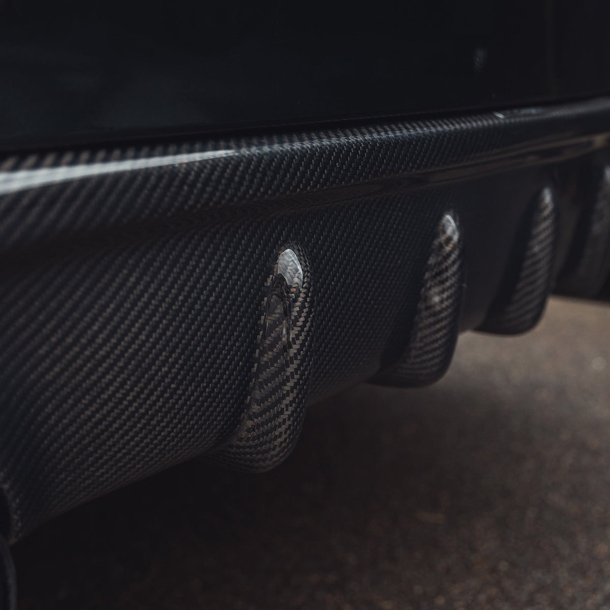 BMW 2 Series F22/F23 carbon fiber diffuser by CT Carbon, featuring a sleek, aerodynamic design for sporty car enhancements.