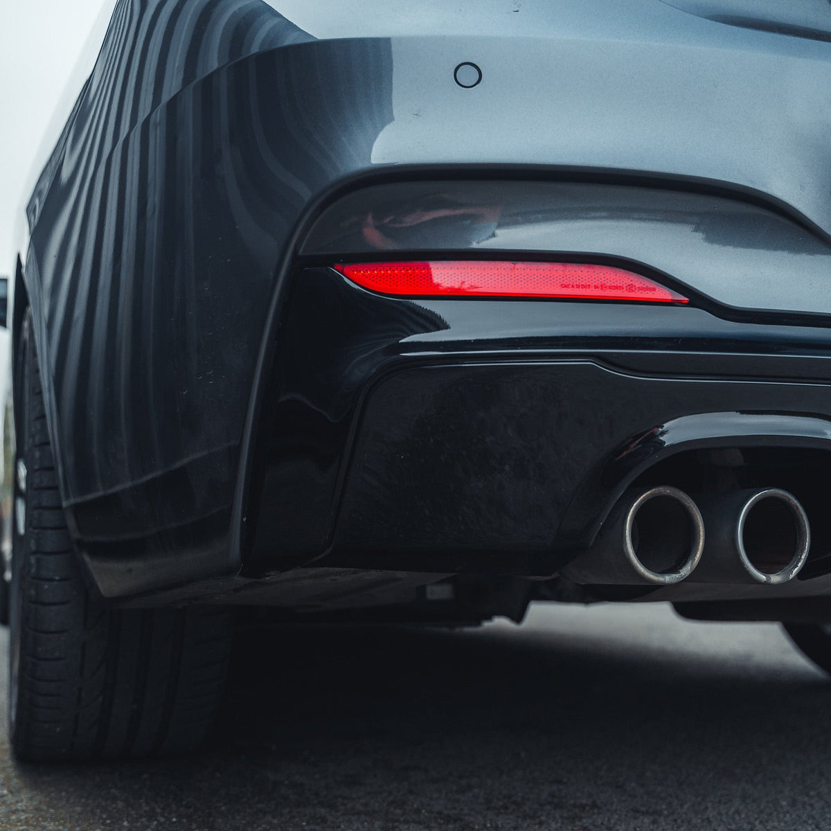 BMW 2 Series F22 F23 CT Carbon gloss black twin exhaust diffuser, rear view showing sleek design and high-quality finish.