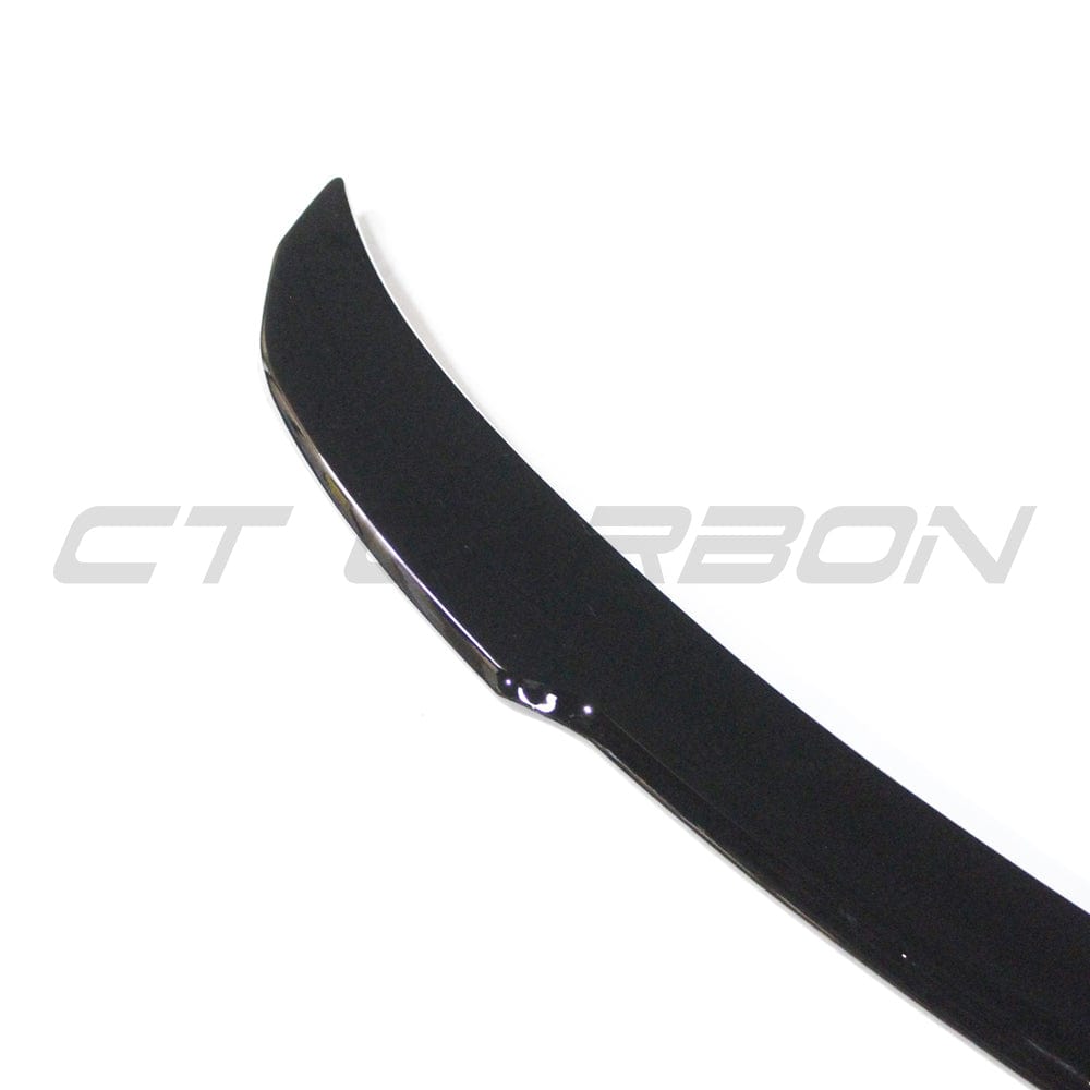 BMW 4 Series F32 V6 gloss black spoiler by CT Carbon, showing the sleek aerodynamic design on the car's rear.