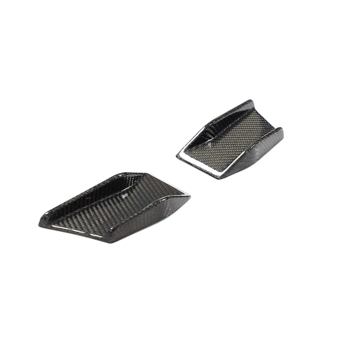 BMW 4 Series G22/G23 carbon fiber canards from CT Carbon, automotive accessories enhancing aerodynamic style.