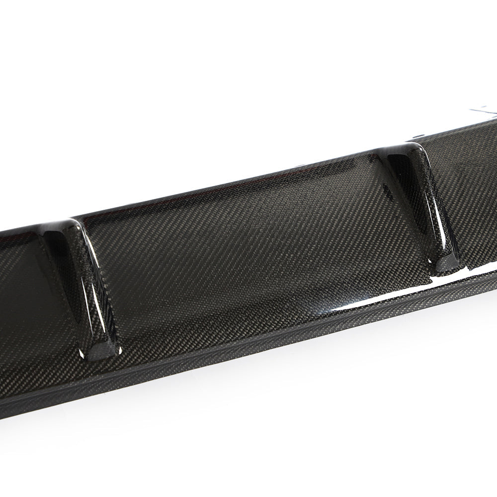 BMW 4 Series G26 i4 carbon fibre diffuser by CT Carbon, showcasing sleek black carbon fibre with aerodynamic design.