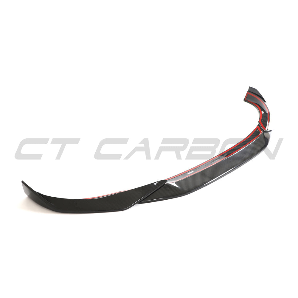 BMW 4 Series G26 and i4 pre-preg carbon fibre splitter by CT Design, shown installed on the front of the vehicle.