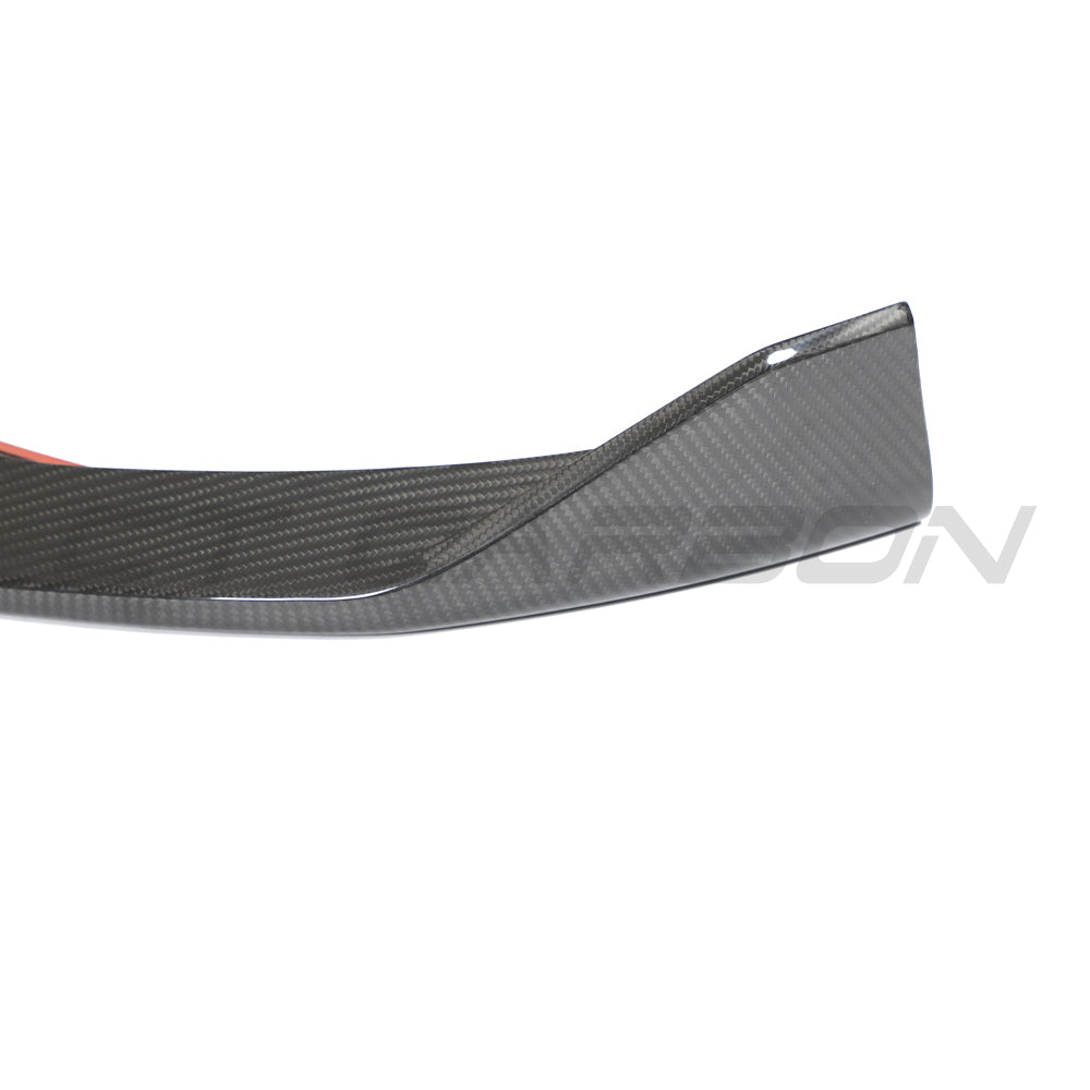BMW 4 Series G26 and i4 pre-preg carbon fiber splitter by CT Design mounted on the front of the vehicle.