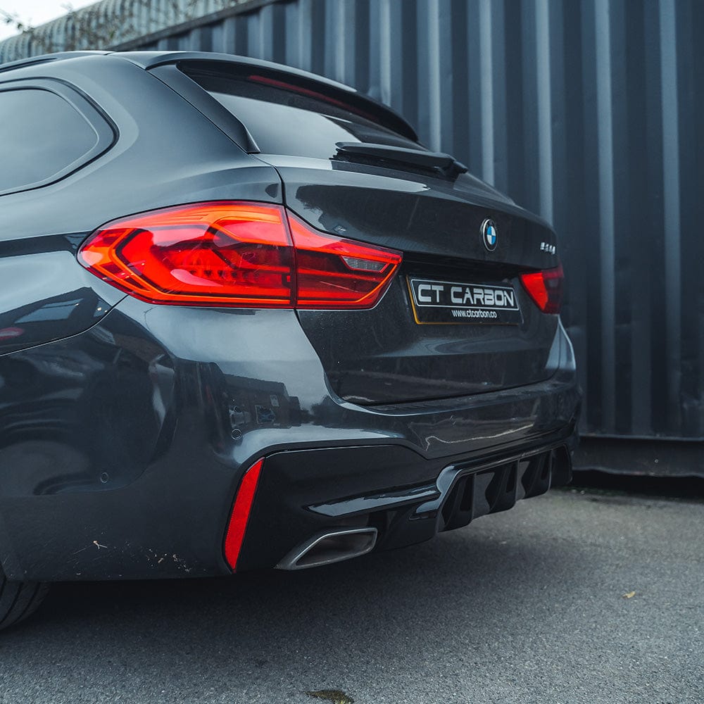BMW 5 Series G30 G31 Pre LCI gloss black diffuser by CT Carbon, M-style V2 for aerodynamic rear enhancement.