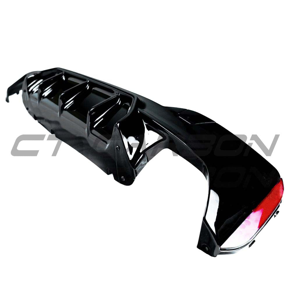 BMW 5 Series G30 G31 pre-LCI gloss black diffuser by CT Carbon, M-style design, showcasing sleek rear bumper enhancement.