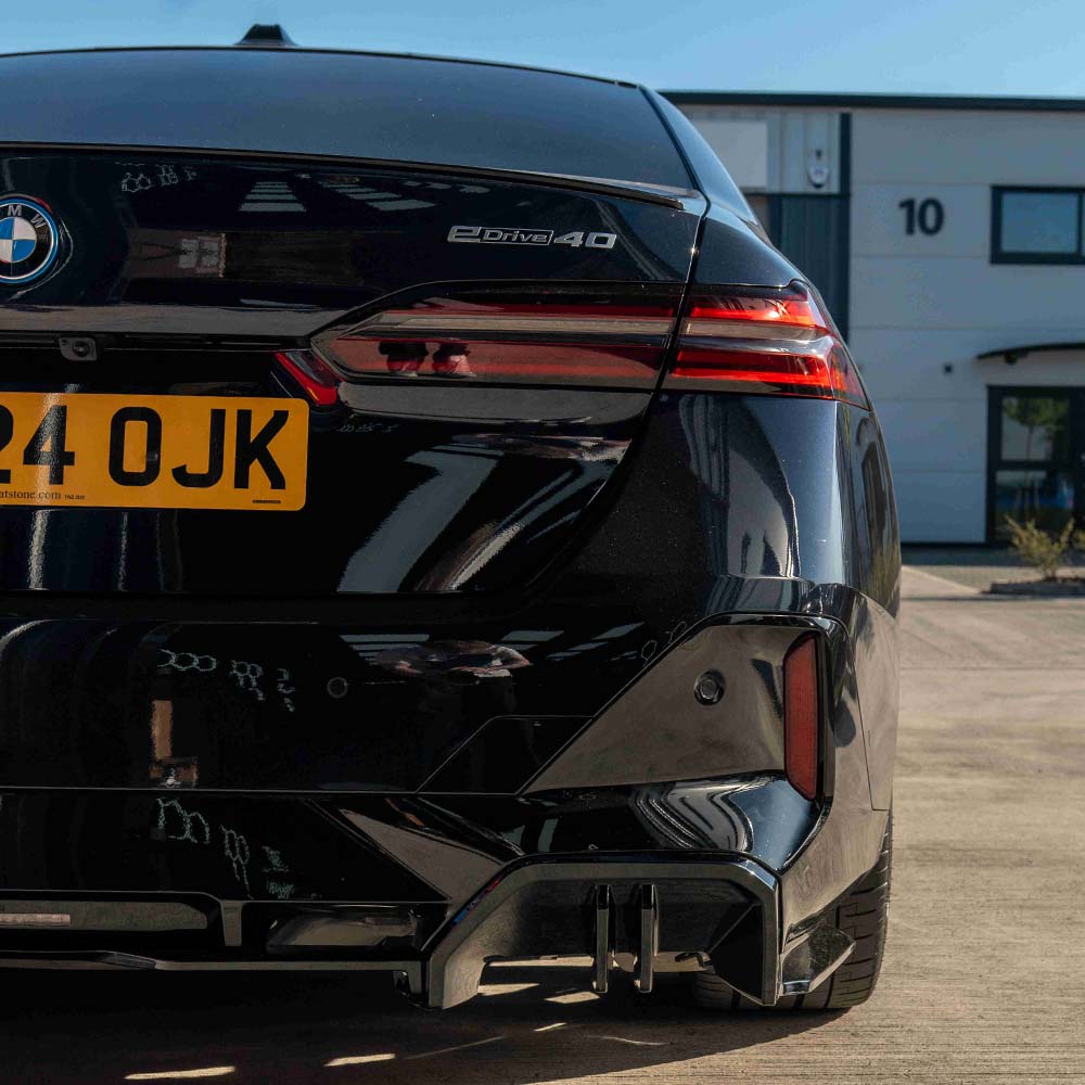 BMW 5 Series G60 and i5 2023 gloss black diffuser by CT Carbon, showing the sleek aerodynamic rear diffuser design.