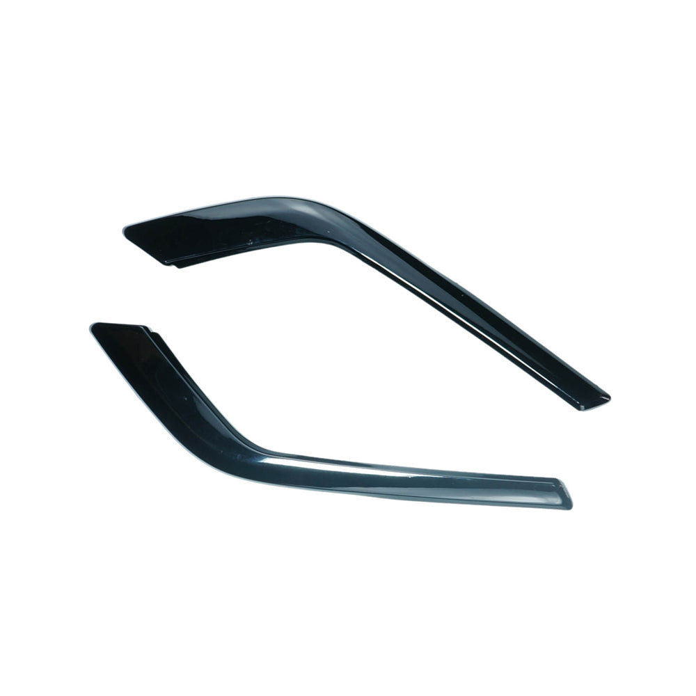 BMW 5 Series G60 and i5 2023 gloss black front bumper corners by CT Carbon, close-up of sleek accessory design.