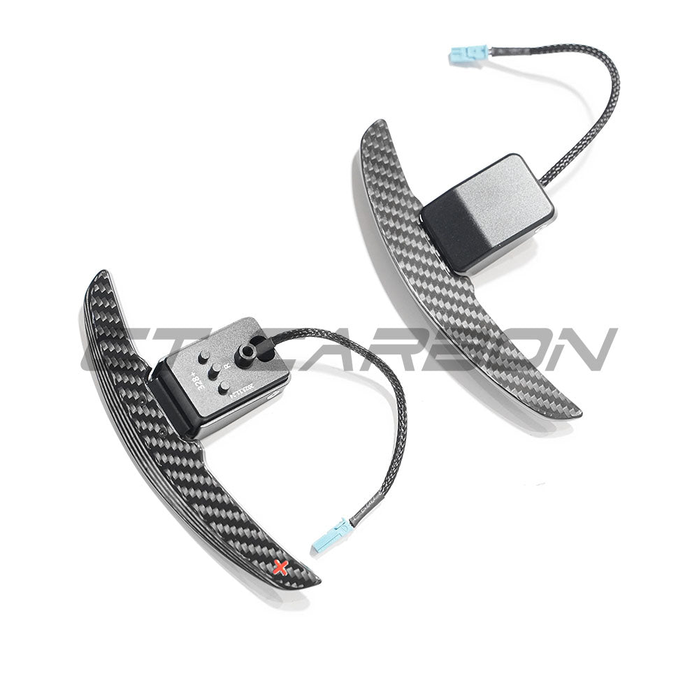 BMW carbon fiber magnetic shifter paddles by CT Carbon, sleek lightweight accessories for enhanced driving control.