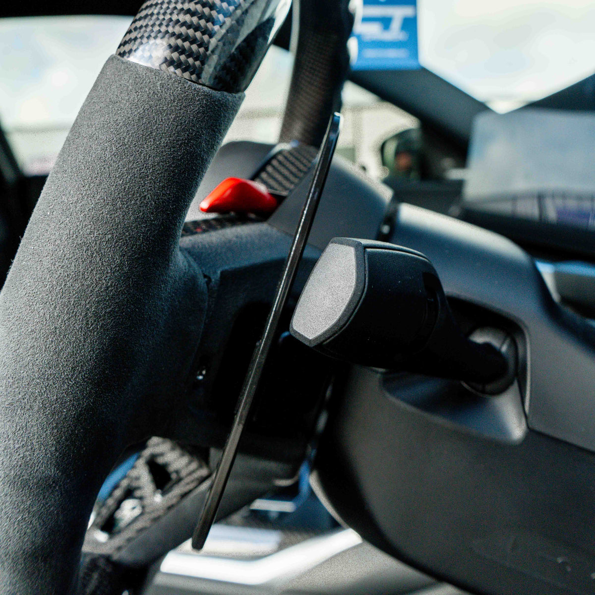 BMW carbon fiber magnetic shifter paddles by CT Carbon, sleek racing-style accessories for enhanced driving control.