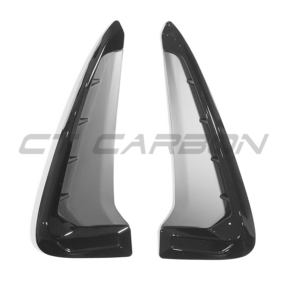 BMW F15 X5 gloss black fender trim accessory by CT Carbon, showing close-up of sleek, polished exterior trim detail.