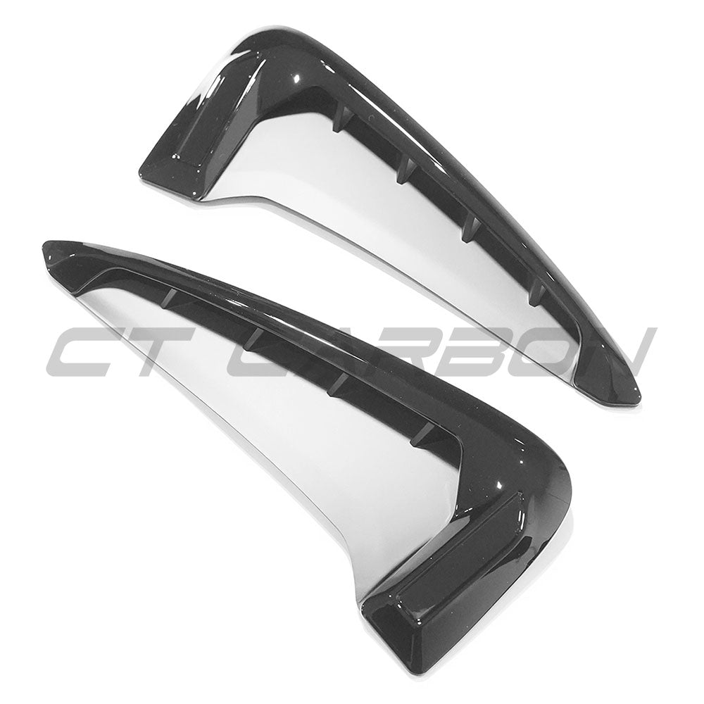 BMW F15 X5 Gloss Black Fender Trim accessory by CT Carbon, showing close-up of sleek, glossy black car fender accents.