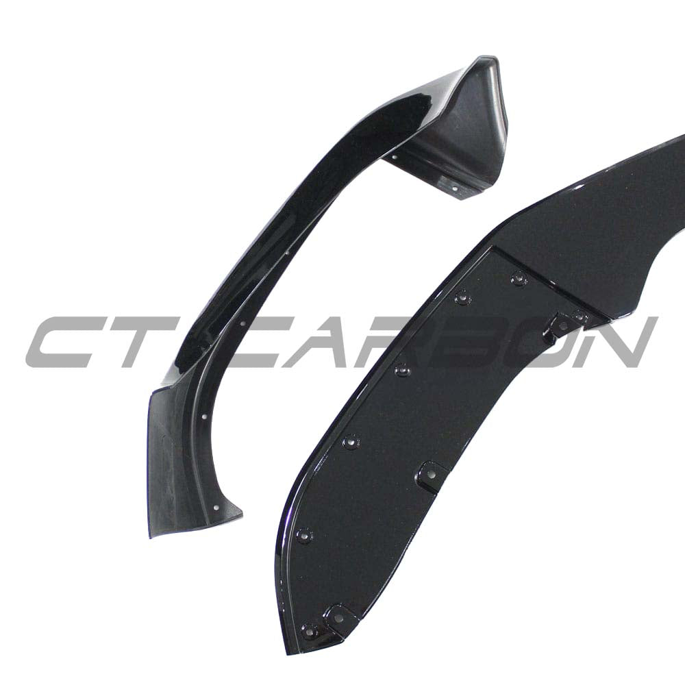 BMW F20 F21 1 Series LCI CT Carbon gloss black splitter mounted on front bumper, showcasing aerodynamic design and sleek finish.