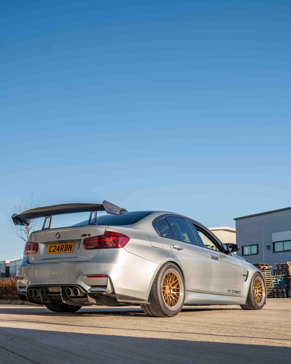 BMW F80 M3 and F30 3 Series carbon fibre swan neck wing spoiler by CT Design, showcasing sleek aerodynamic design and lightweight construction.