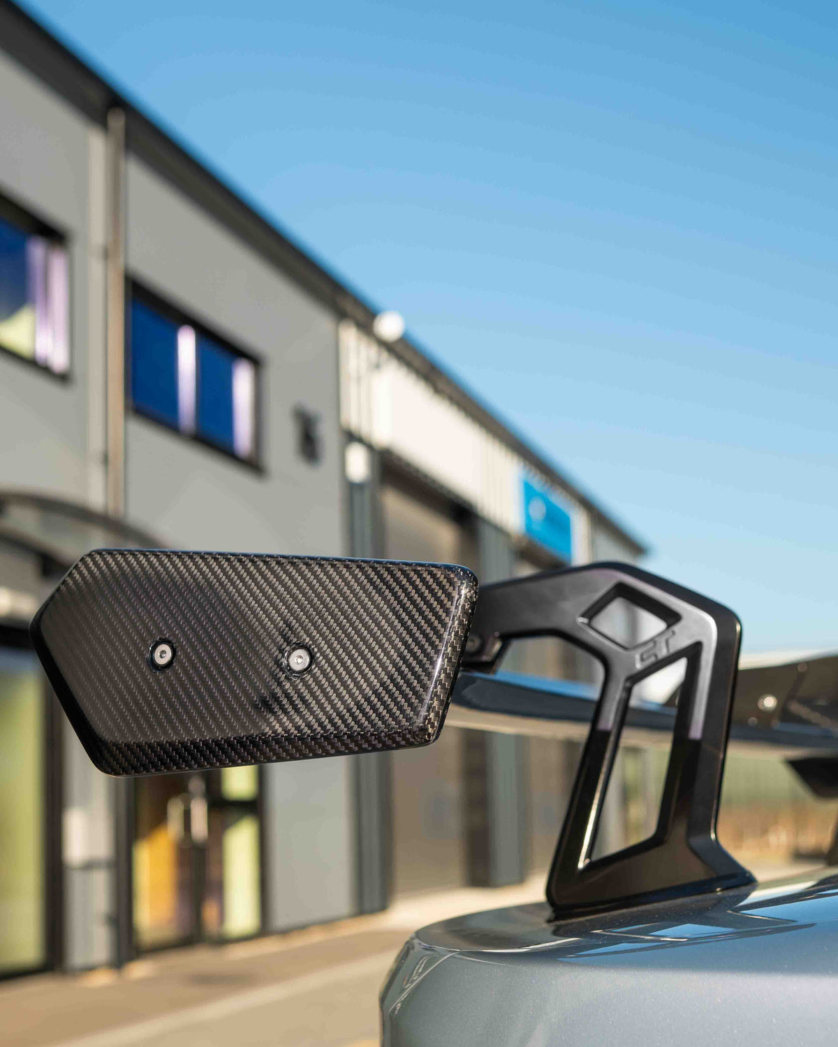 BMW F80 M3 and F30 3 Series carbon fiber swan neck wing spoiler by CT Design, showcasing its sleek aerodynamic design