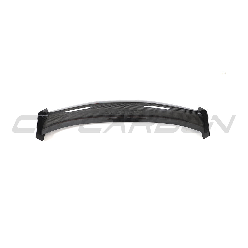 BMW G87 M2 and G42 2 Series Carbon Fibre Swan Neck Wing spoiler by CT Carbon mounted on the car's rear.