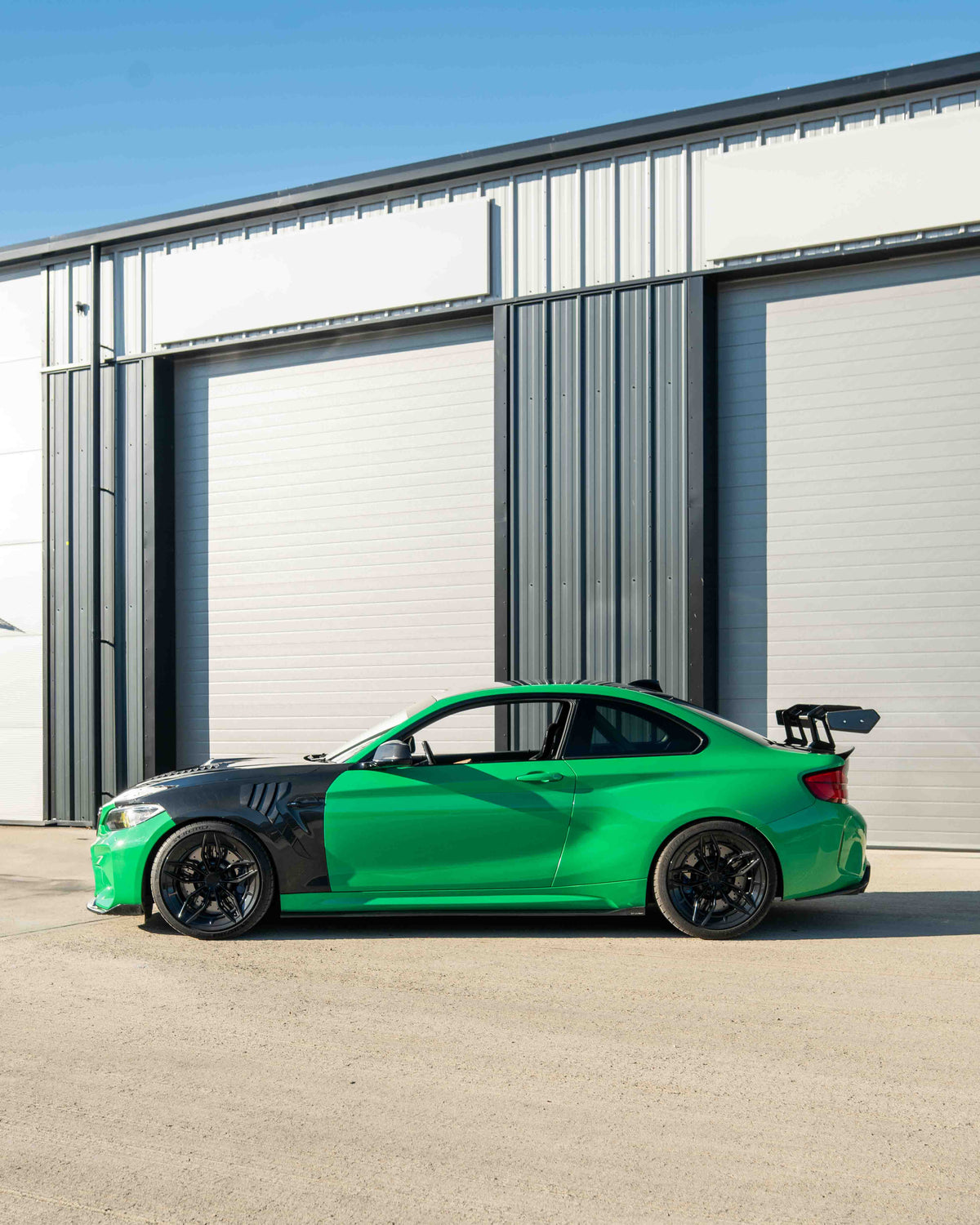 BMW F87 M2/M2C and F22 2 Series carbon fibre swan neck spoiler by CT Carbon, showcasing sleek aerodynamic design.