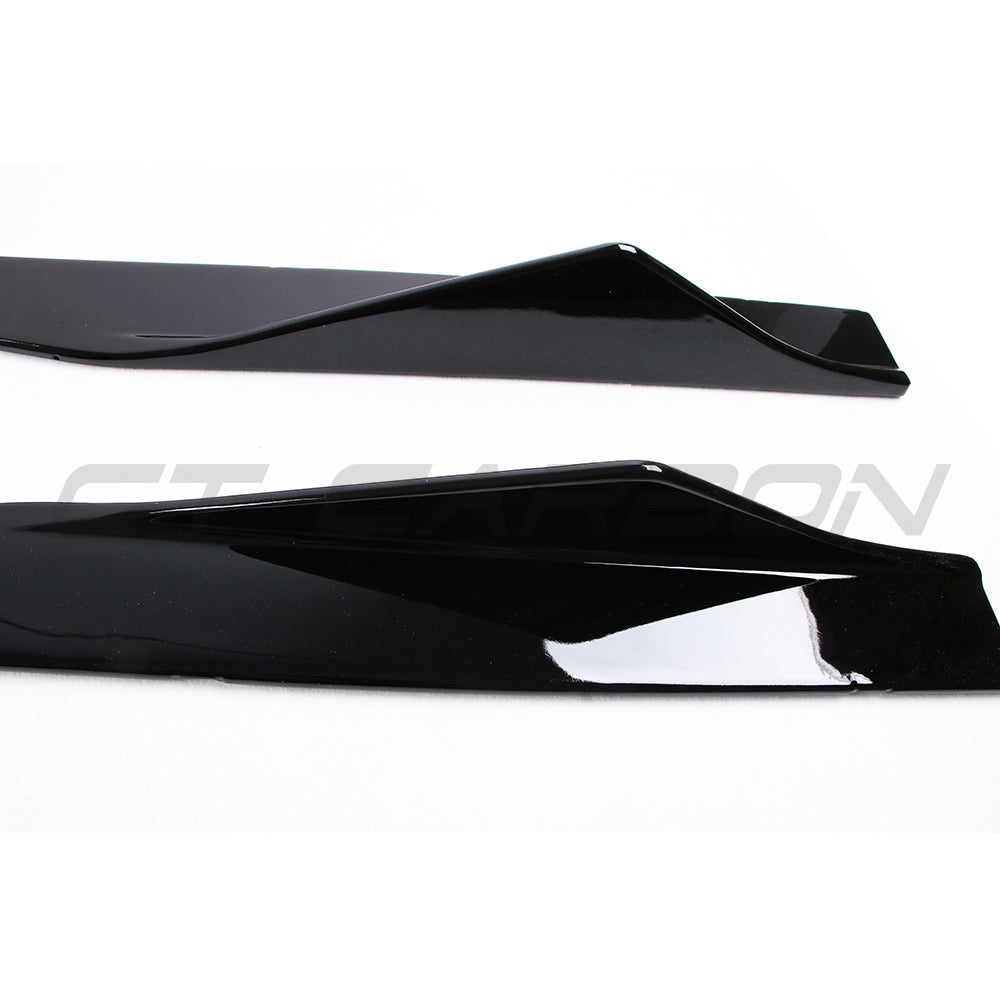 BMW F87 M2 M2C side skirts by CT Carbon in gloss black, showcasing sleek, aerodynamic design for enhanced sporty appearance.