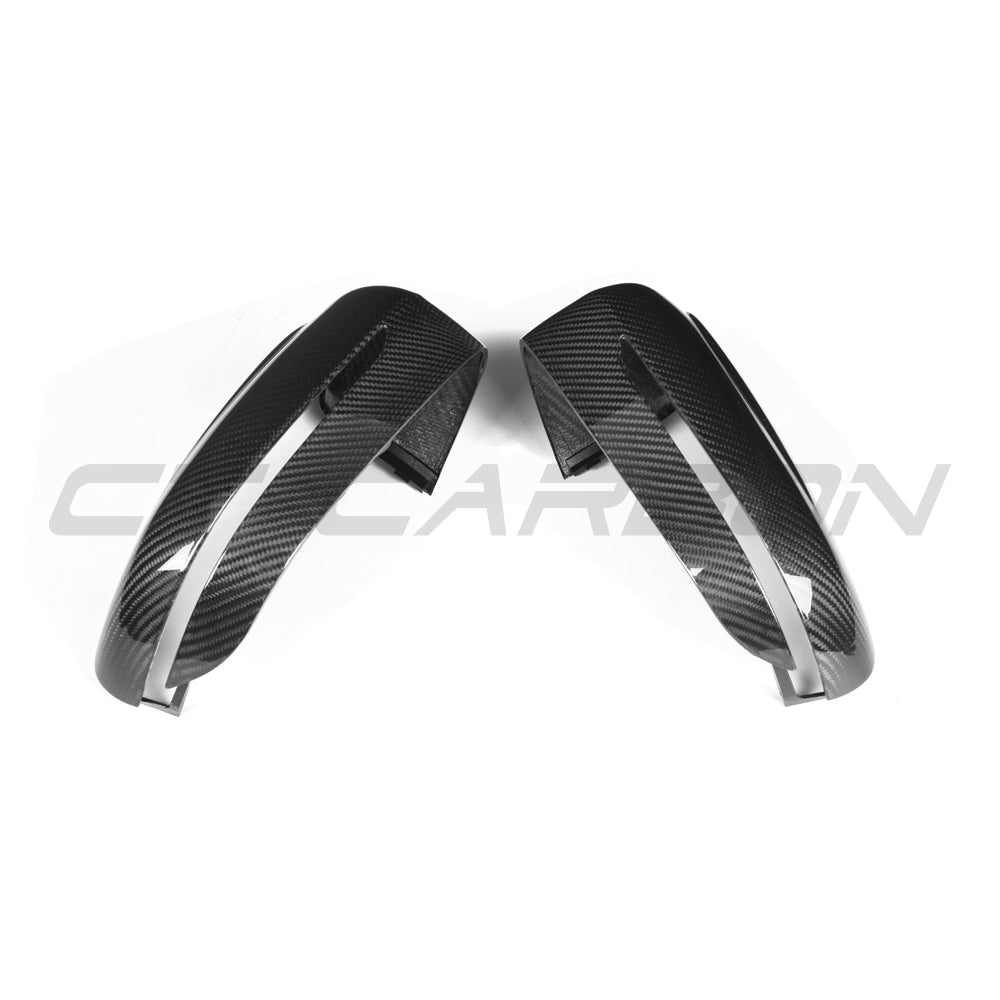 BMW F90 M5 2018-2023 RHD carbon fiber mirror accessories by CT Carbon, showing sleek, pre-preg carbon fiber side mirrors.