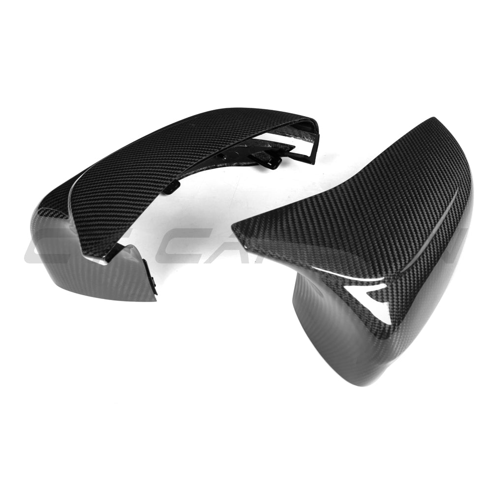 BMW F90 M5 2018-2023 CT Carbon pre-preg carbon fibre side mirrors for RHD models, shown on a sleek car.