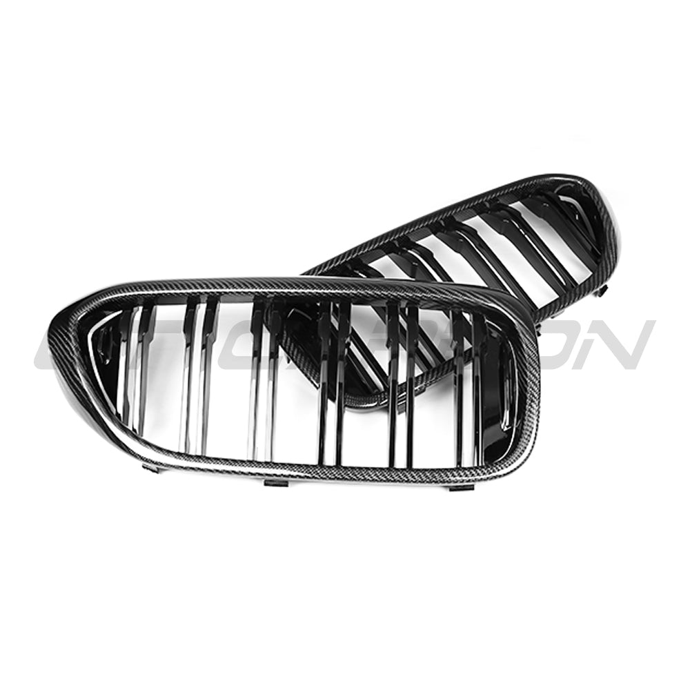 BMW F90 M5 and G30 G31 5 Series Pre-LCI carbon fibre grille by CT Carbon, showing close-up of sleek, textured carbon fiber design.