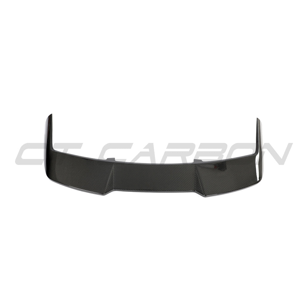 BMW F95 X5M 2019-2022 carbon fibre roof spoiler kit by CT Design, showcasing sleek, aerodynamic carbon fibre parts on the vehicle.