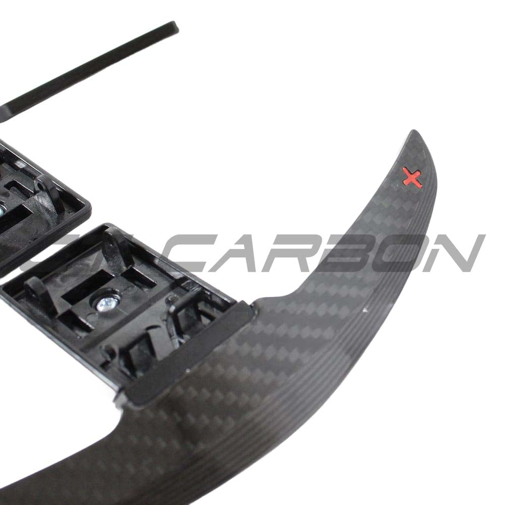 BMW Fxx carbon fiber shifter paddles by CT Carbon, lightweight accessories with sleek carbon fiber finish for Fxx series vehicles.