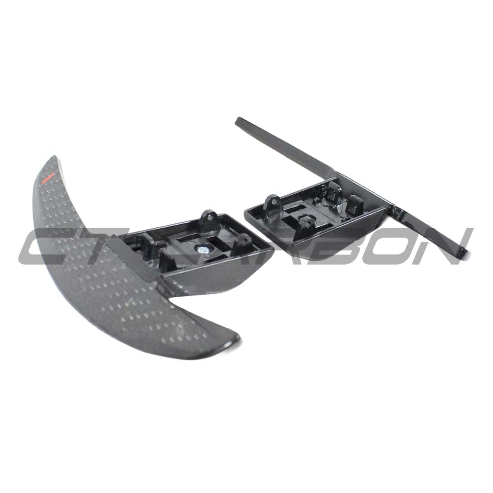 BMW Fxx carbon fiber shifter paddles by CT Carbon, sleek lightweight accessories for sporty steering control.