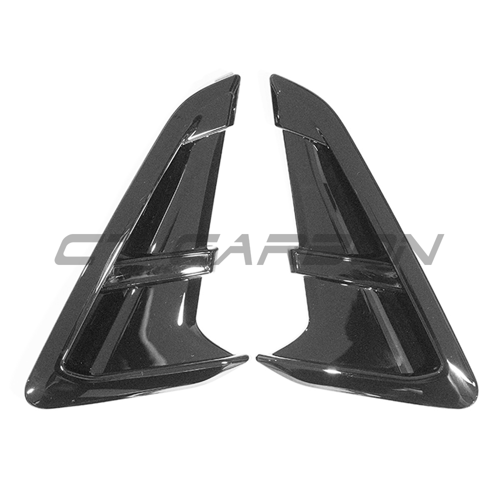 Gloss black BMW G01 X3 fender trims by CT Carbon, close-up view of the sleek vehicle accessory on the front fender.