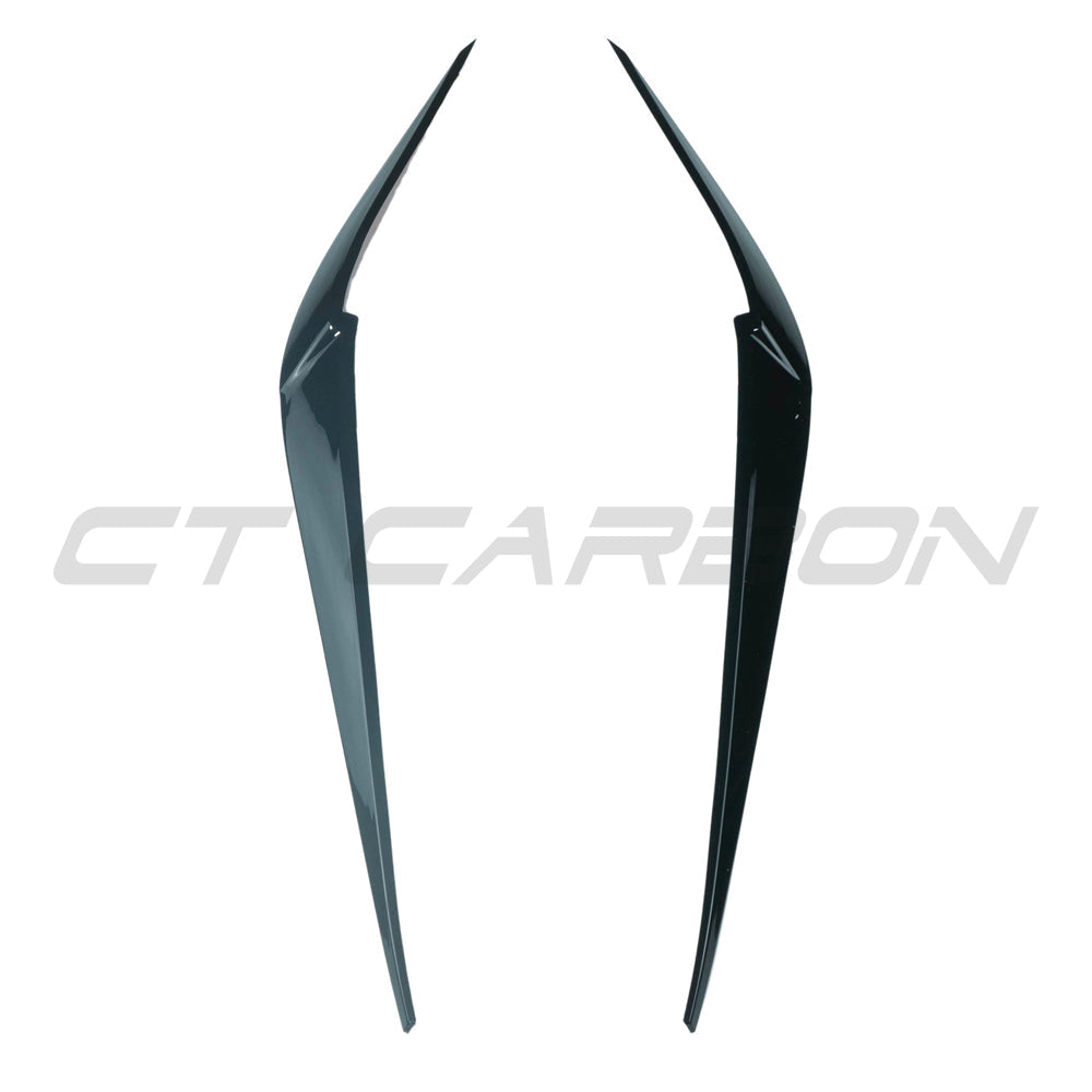 BMW G01 G02 F97 F98 X3 X4 X3M X4M gloss black headlight eyebrows accessory by CT Carbon, close-up of sleek black headlight accents