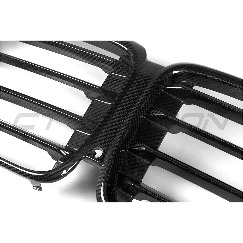 BMW G05 X5 LCI carbon fibre grille by CT Carbon, close-up of sleek black grille with textured carbon fiber finish.
