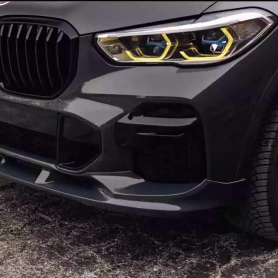 BMW G05 X5 yellow DRL module set by CT Carbon for 2019-2022, featuring bright LED daytime running lights on a black SUV.