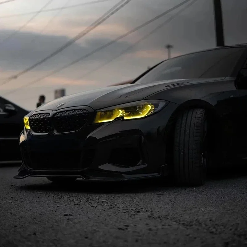 BMW G20 G21 3 Series yellow adaptive LED DRL module set by CT Carbon, shown with yellow daytime running lights on the front of the vehicle.
