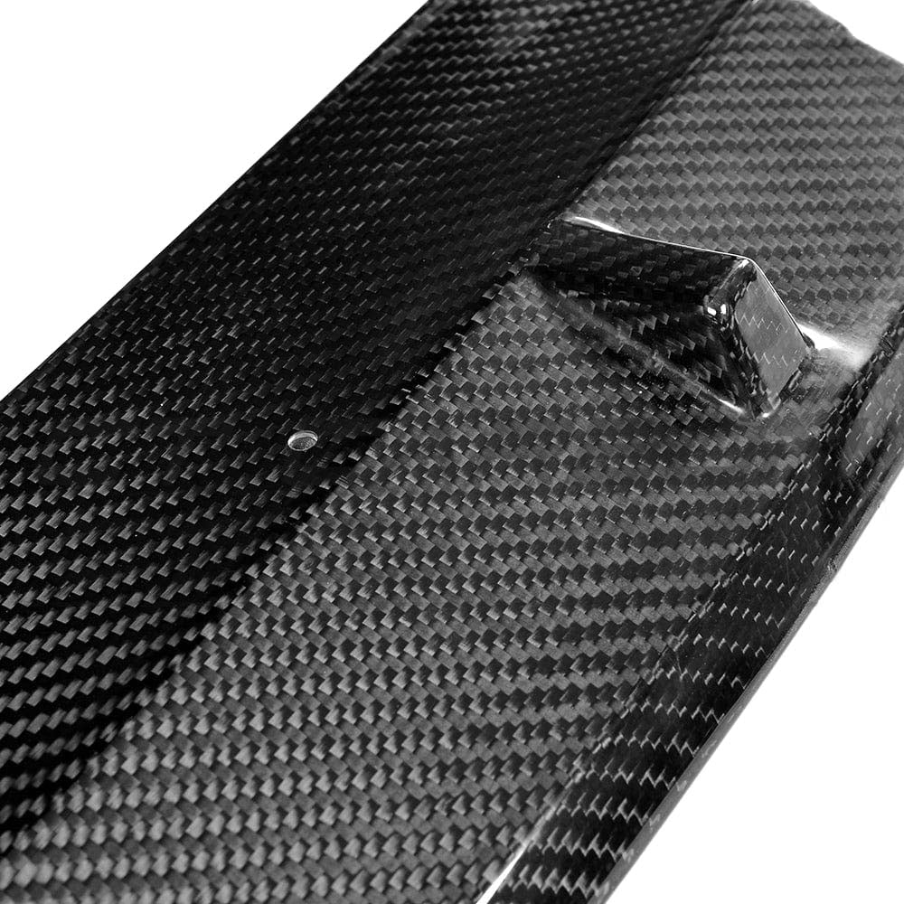 BMW G30 5 Series carbon fibre kit by CT Carbon, featuring V3 splitter and M Sport style accents on a sleek car front.