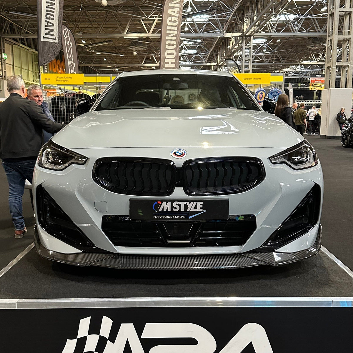 BMW G42 2 Series carbon fiber splitter by CT Design, showcasing sleek, lightweight aerodynamic enhancement for the front bumper.
