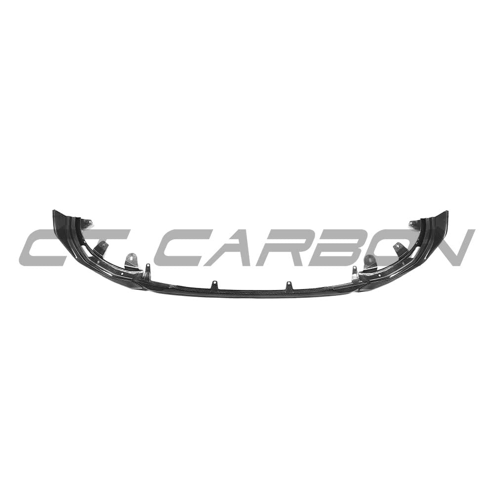 BMW G42 2 Series carbon fibre splitter by CT Carbon, V1 style, showing the aerodynamic front splitter design with visible carbon fiber texture.