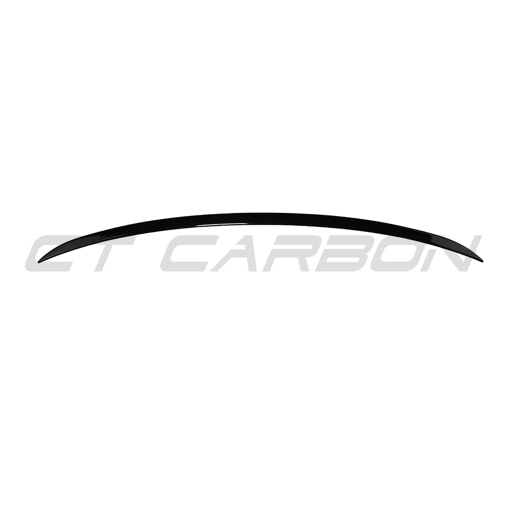 CT Carbon gloss black spoiler for BMW G60 and i5 5 Series 2023 models, showing a sleek aerodynamic design on the car's rear.