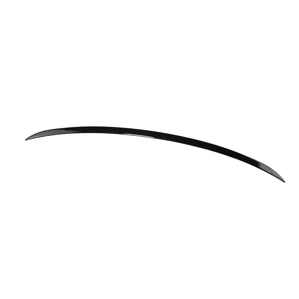 BMW G60 and i5 5 Series 2023 CT Carbon gloss black spoiler installed on the car's rear for aerodynamic enhancement.