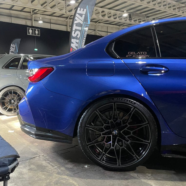 BMW G82 M4 full carbon fibre kit by CT Design, showing the sleek carbon fibre body parts on the car's exterior.