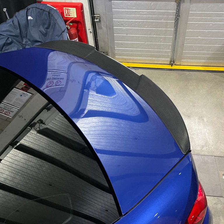 BMW G82 M4 full carbon fibre kit by CT Design, showing lightweight, high-performance carbon fibre components on the car.