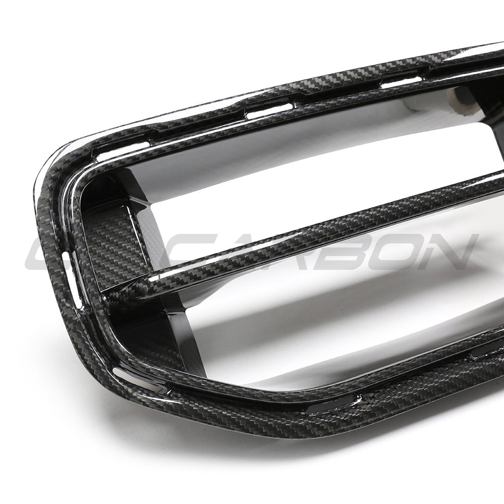 BMW G87 M2 carbon fiber front grille accessory by CT Carbon, showcasing the sleek, lightweight carbon fiber design on a sporty car.