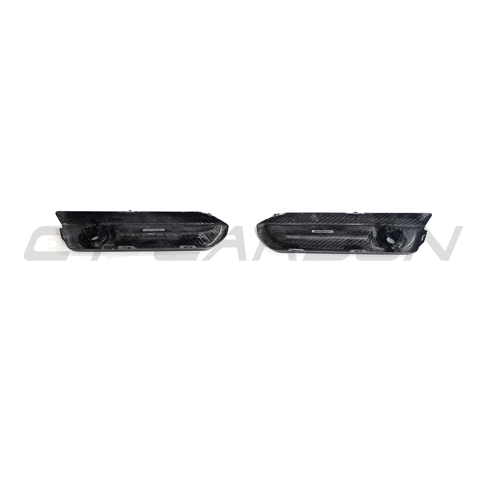 BMW G87 M2 carbon fiber reflector delete accessory by CT Design, showing sleek black carbon fiber detail on the vehicle.