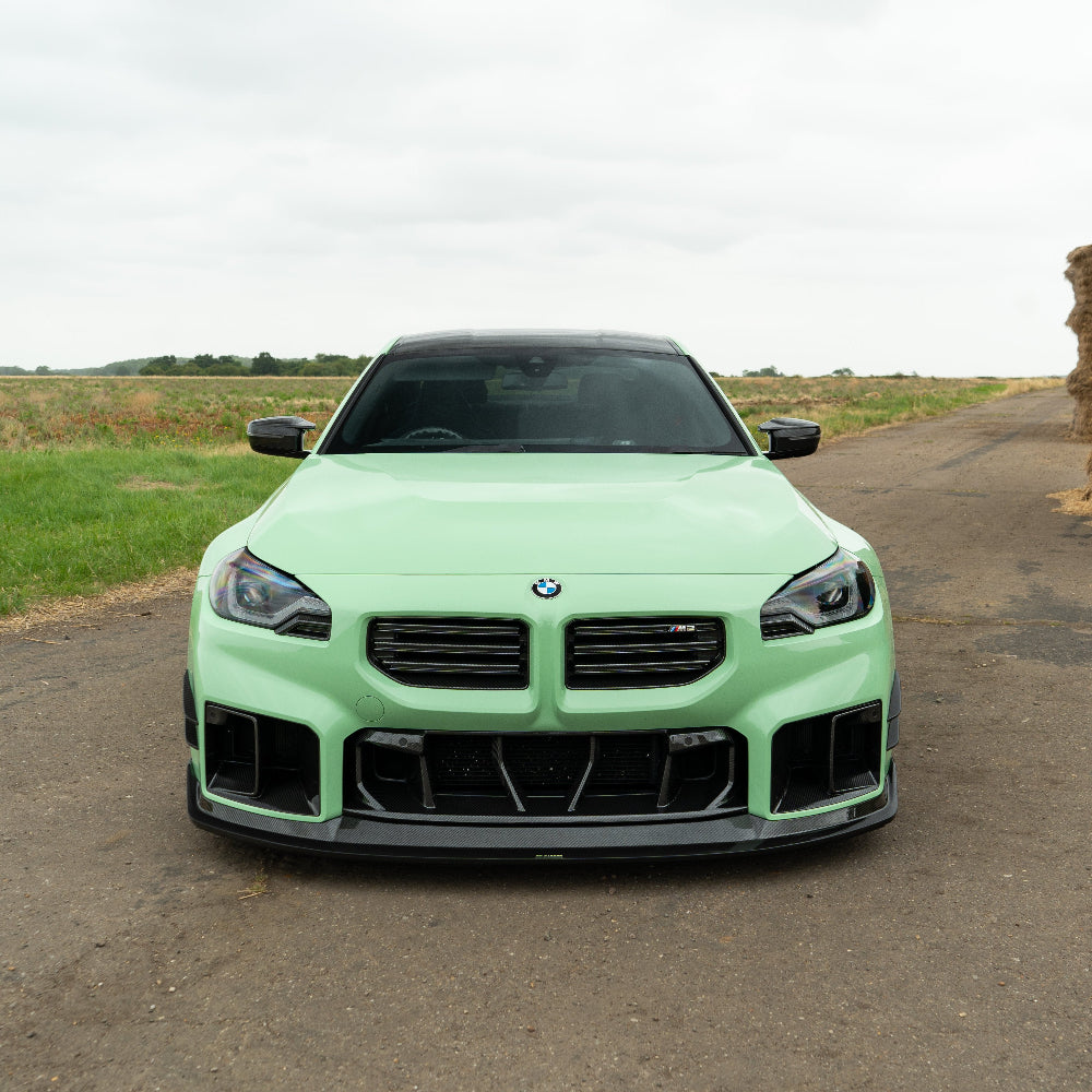 BMW G87 M2 carbon fibre splitter by CT Design, showcasing the sleek, lightweight V4 splitter installed on the front of the car.