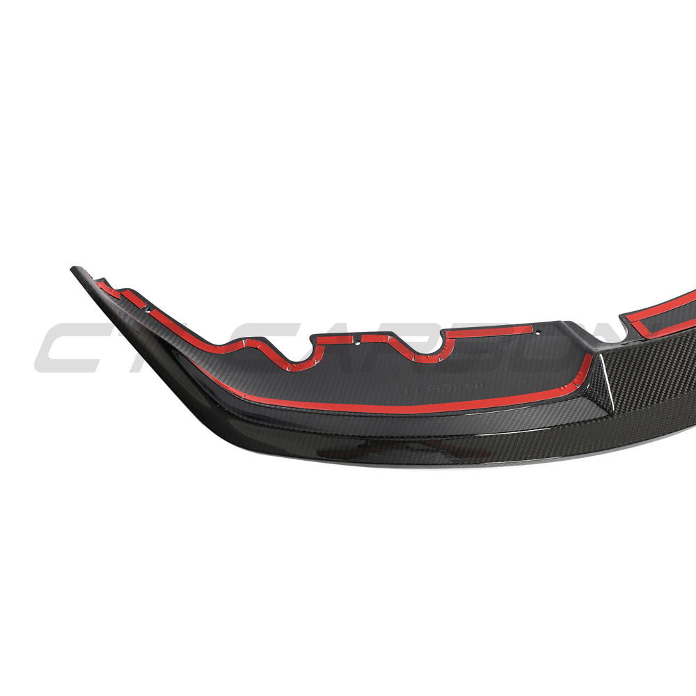 BMW G87 M2 carbon fibre splitter by CT Carbon, V4 version, showcasing sleek aerodynamic design on the car's front bumper.