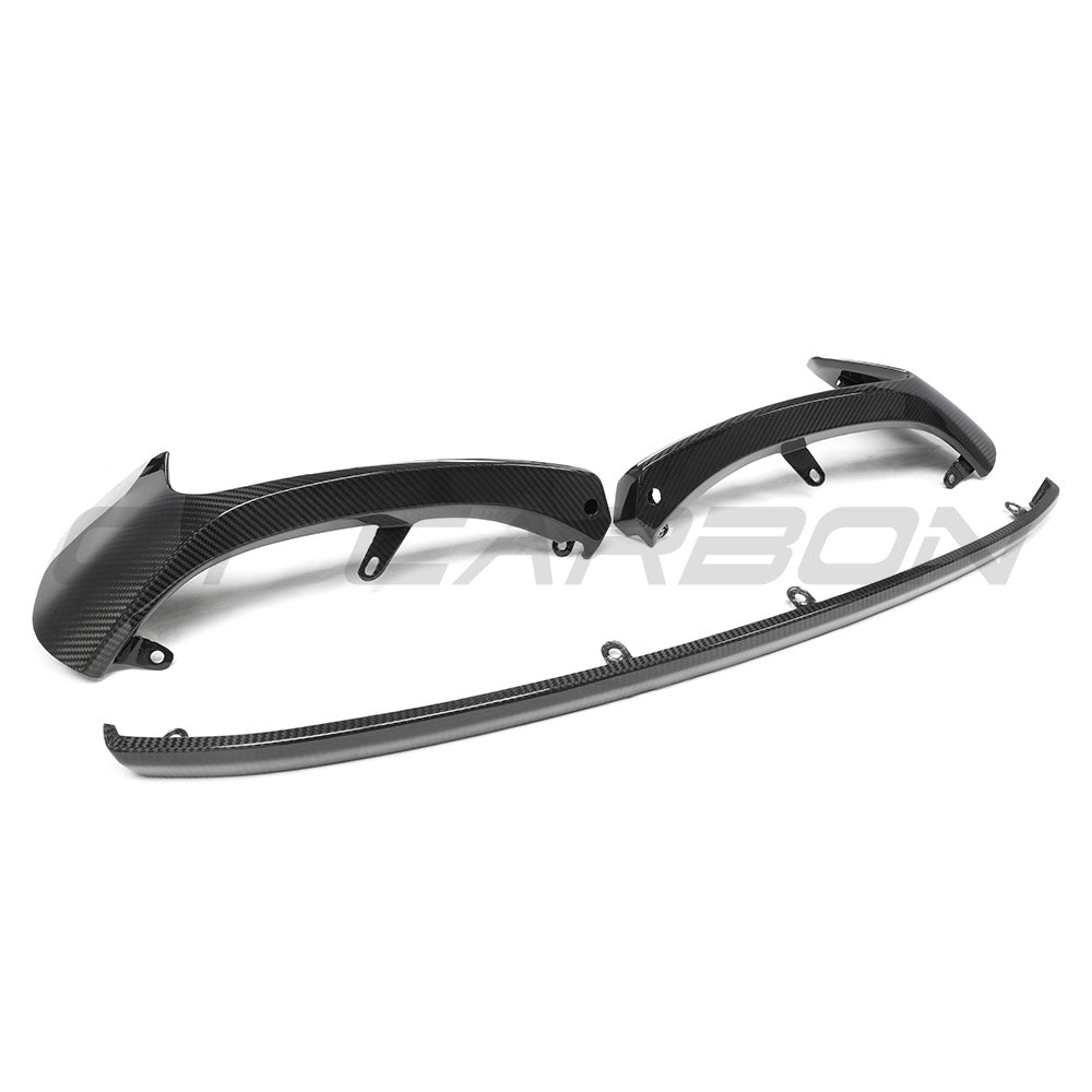 BMW G87 M2 full carbon fiber kit by CT Carbon, including body panels and accessories in a sleek carbon fiber finish.