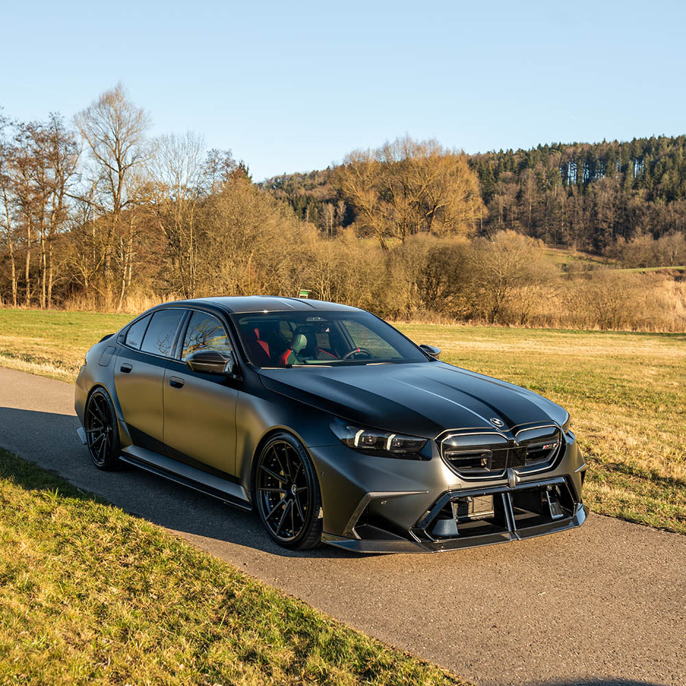 BMW G90 M5 and G99 M5 Touring 2024 carbon fibre side skirts by CT Design, showcasing sleek, lightweight side skirts for sporty appearance.