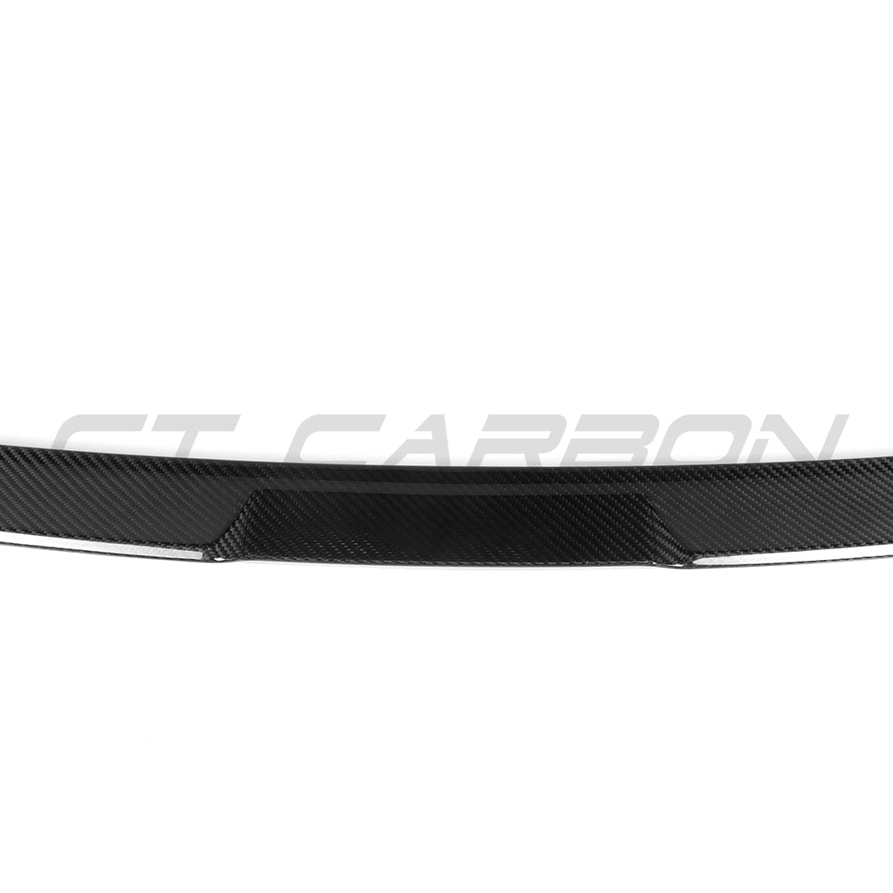 BMW G60 5 Series carbon fibre kit by CT Carbon, including a sleek full carbon fibre spoiler for the 2023 model.