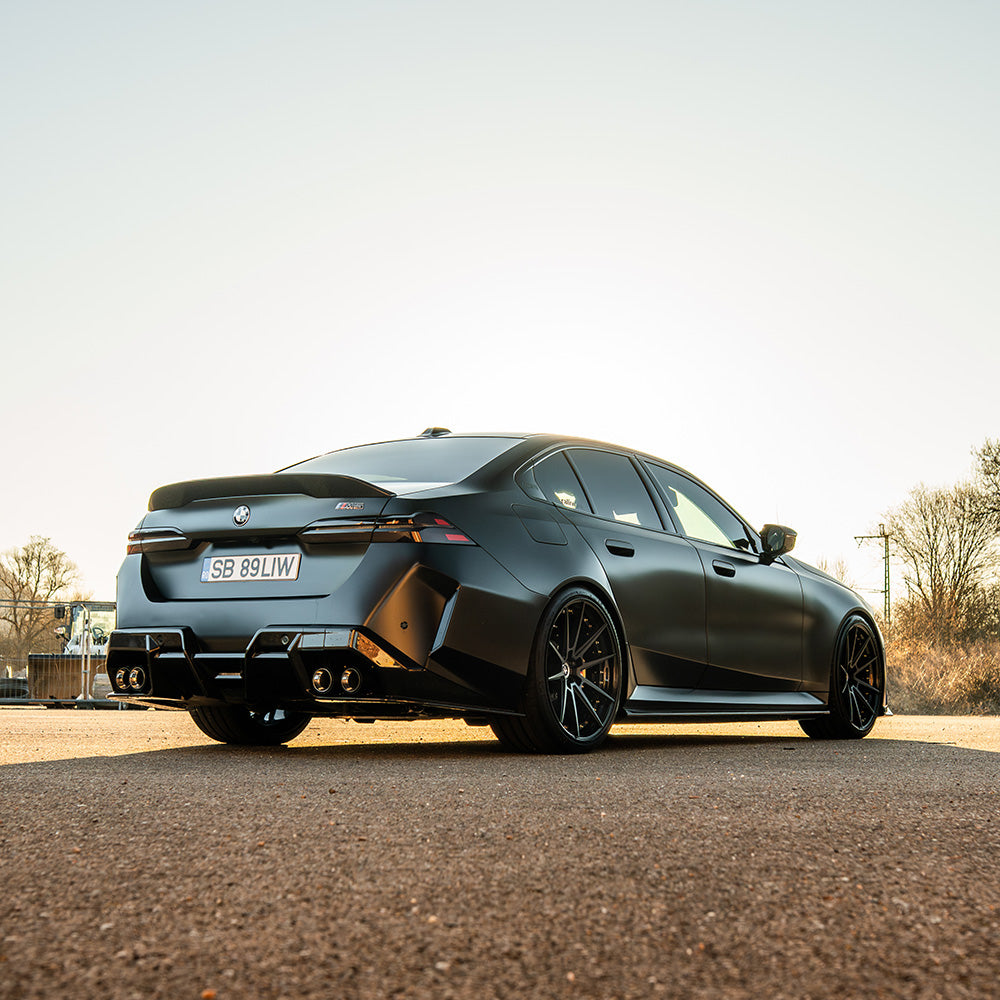 BMW G90 G99 M5 2024 carbon fibre diffuser by CT Design, showcasing sleek aerodynamic design and high-quality carbon fiber finish.