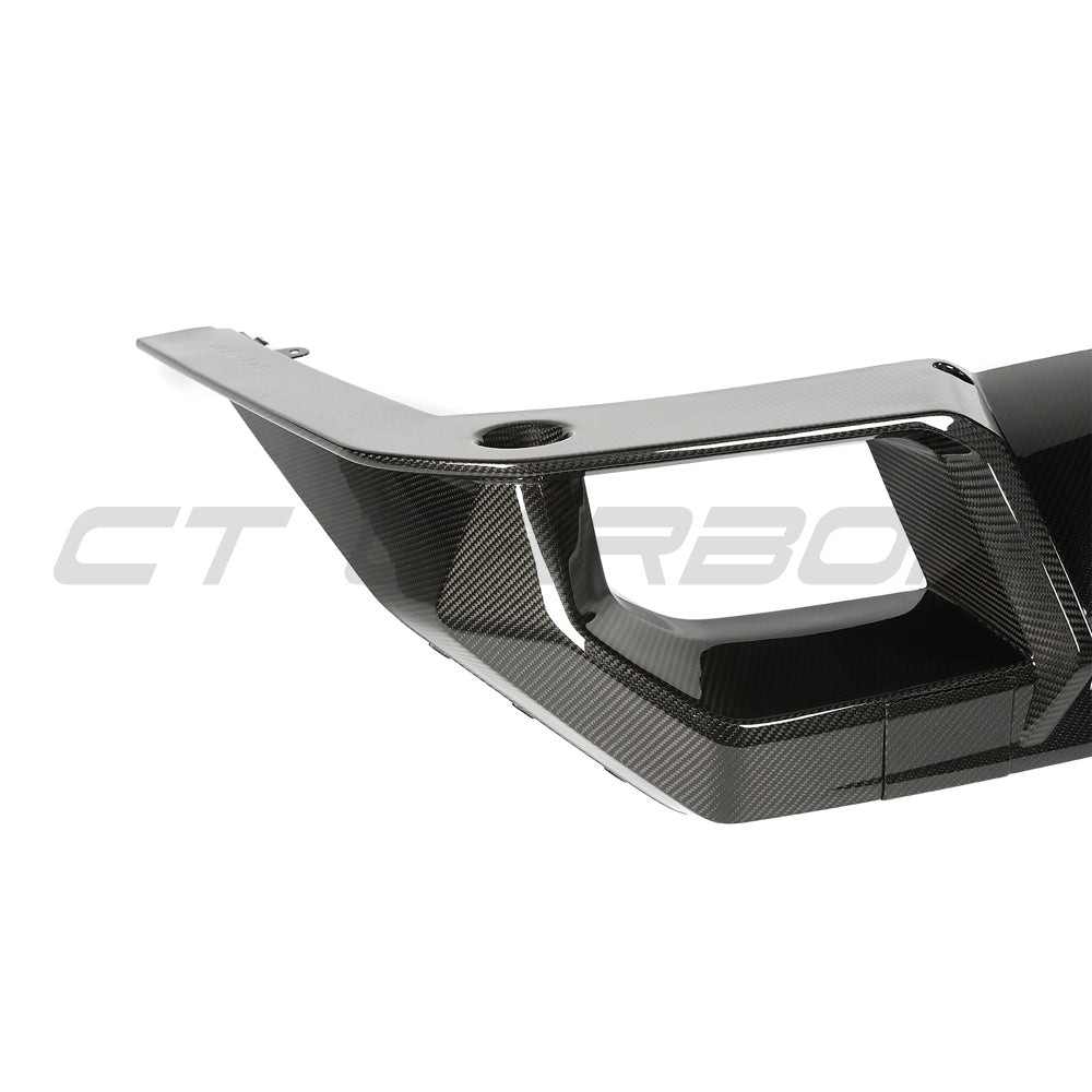 BMW G90 G99 M5 2024 carbon fiber diffuser by CT Design, showcasing sleek aerodynamic design for M5 models.
